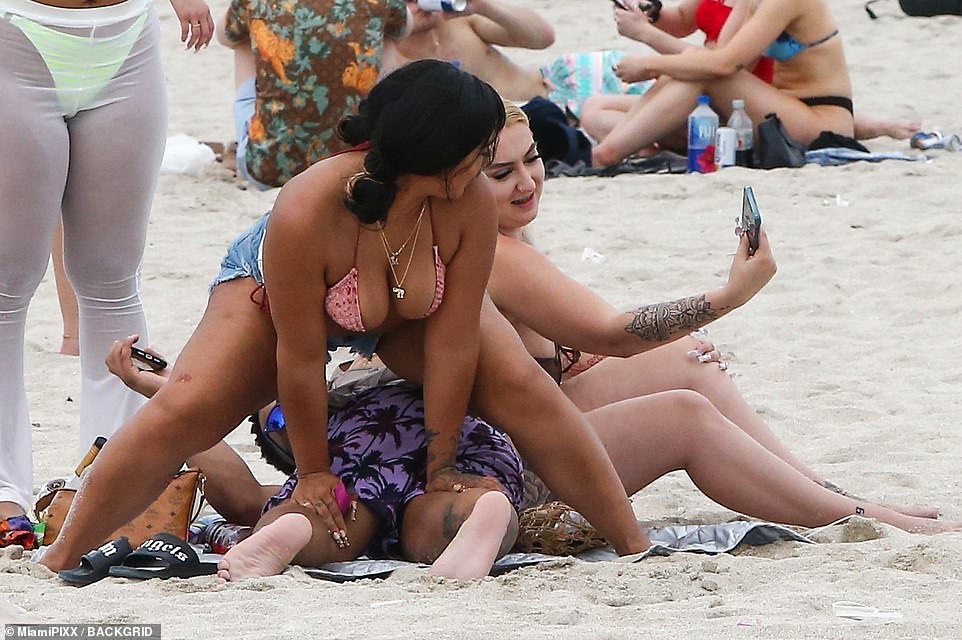 Selfies abound on Miami Beach.  Everyone wants to post on their social media that they made the scene for Spring Break 2022.