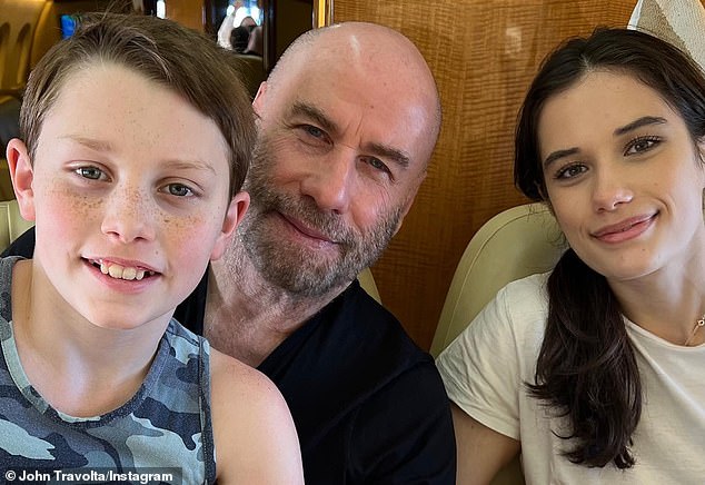 Happy family: Travolta is a parent to daughter Ella Bleu and son Benjamin, 11 (pictured)