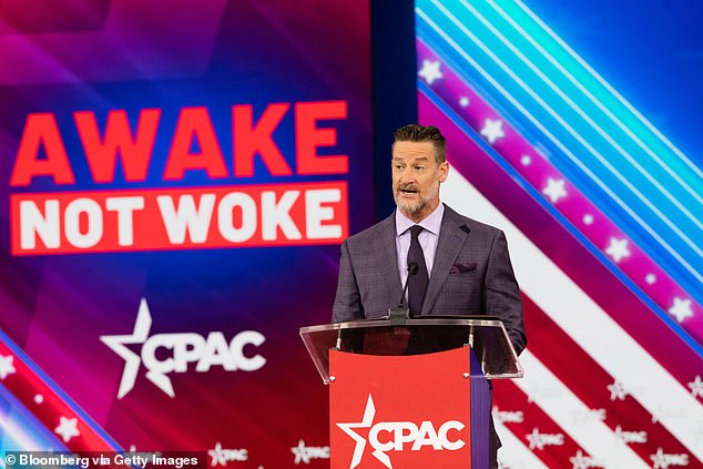 Steube is pictured speaking at the CPAC conference in Orlando in February 2022