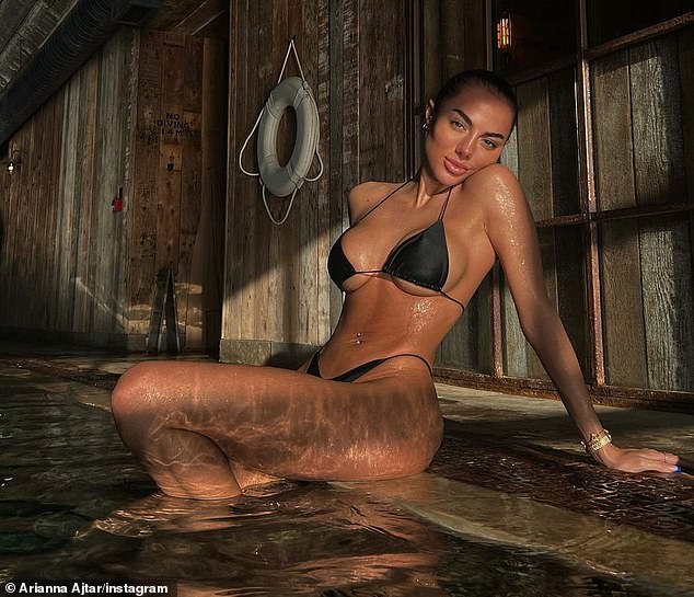 Wow!  The 27-year-old actress showed off her underbust in a tiny black bikini as she took a dip in the pool during a birthday trip to Soho Farmhouse in Oxfordshire