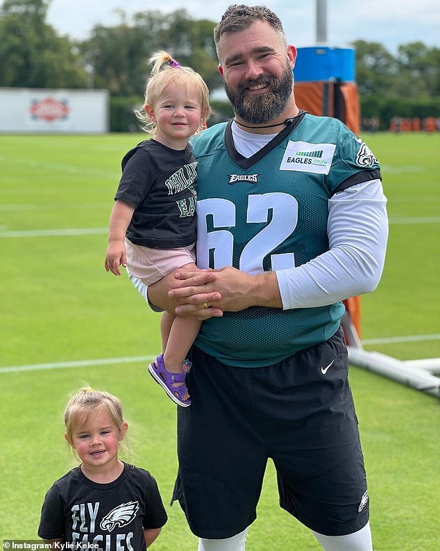 Kelce appears with his daughters, including young Wyatt (left), seen in the video