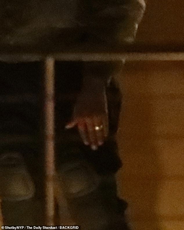 Locked: They arrived at the restaurant just before North, Kanye was wearing what appeared to be a wedding ring on his finger