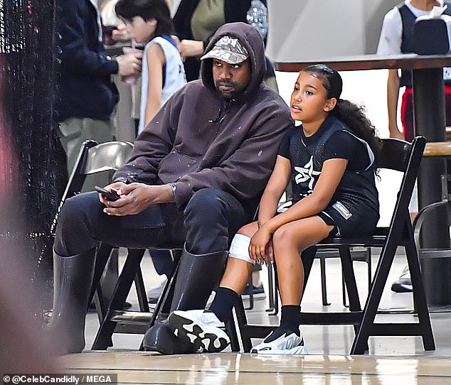 Dad-daughter date: The nuptials come after the Yeezy founder and reality star finally settled their November divorce and a string of romances for the rapper;  Kanye and North at their basketball game in 2022