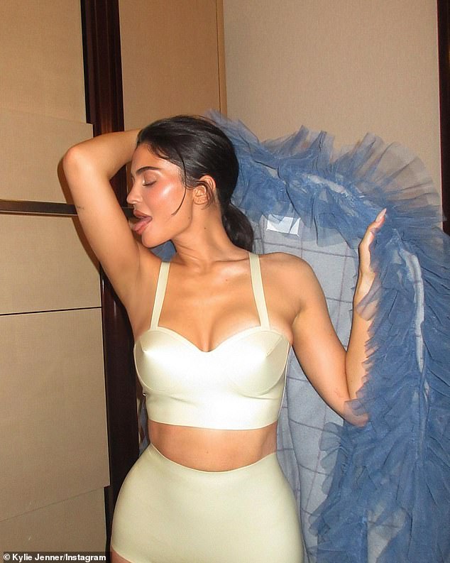 This will make tongues wag: Kylie Jenner posed for an impromptu Instagram lingerie shoot while getting ready for a Paris fashion show on Sunday