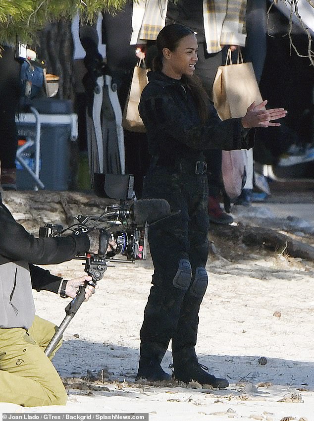 A moment of calm: Here she held her hands together after filming a scene