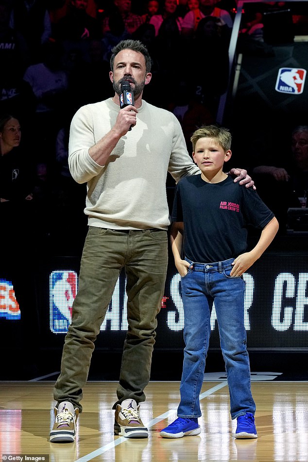 Before the star-studded game began, the 50-year-old Justice League actor addressed basketball fans at Vivint Arena with his 10-year-old son Samuel by his side