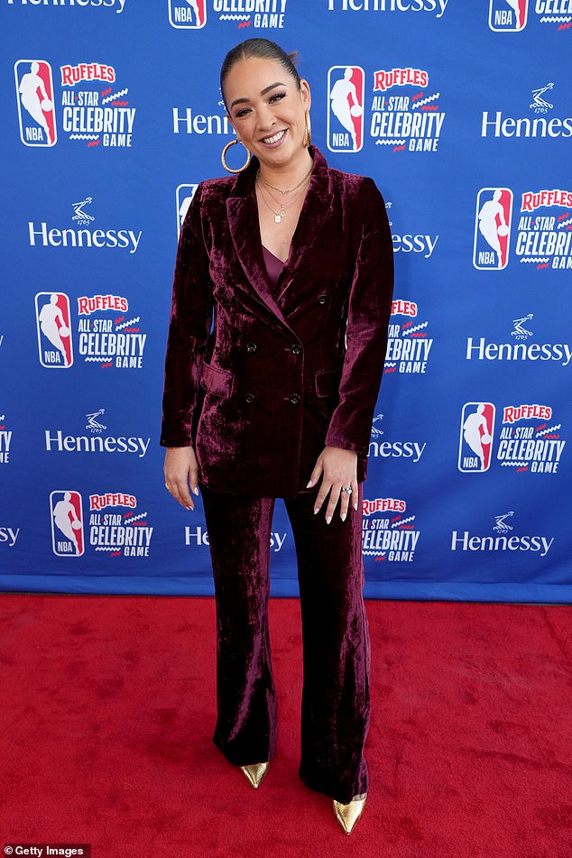 Pants suit: ESPN presenter Cassidy Hubbarth, 38, modeled a dark purple velvet suit.  She wore huge hoop earrings and her hair was tied back in a tight bun