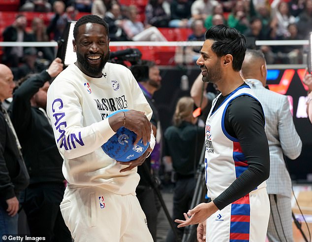 Laughing: He later shared a laugh with former NBA star Dwyane Wade