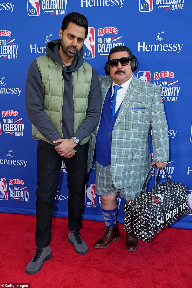 Fitting: He also snapped a photo with TV personality Guillermo Rodriguez, who arrived at the event in a plaid suit that ended in shorts rather than pants