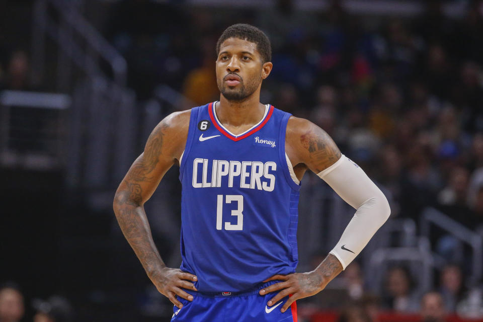 Los Angeles Clippers forward Paul George (13) looks on during the second half of an NBA basketball game against the Oklahoma City Thunder Tuesday, March 21, 2023 in Los Angeles.  (AP Photo/Ringo HW Chiu)
