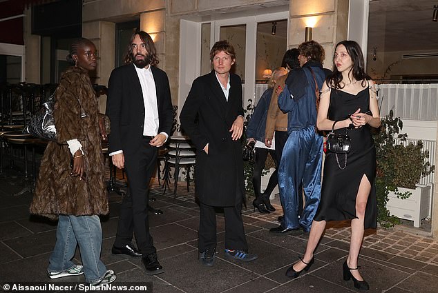 Trouble in paradise?  The 36-year-old photographer left without the 49-year-old supermodel as he celebrated with friends in the French capital