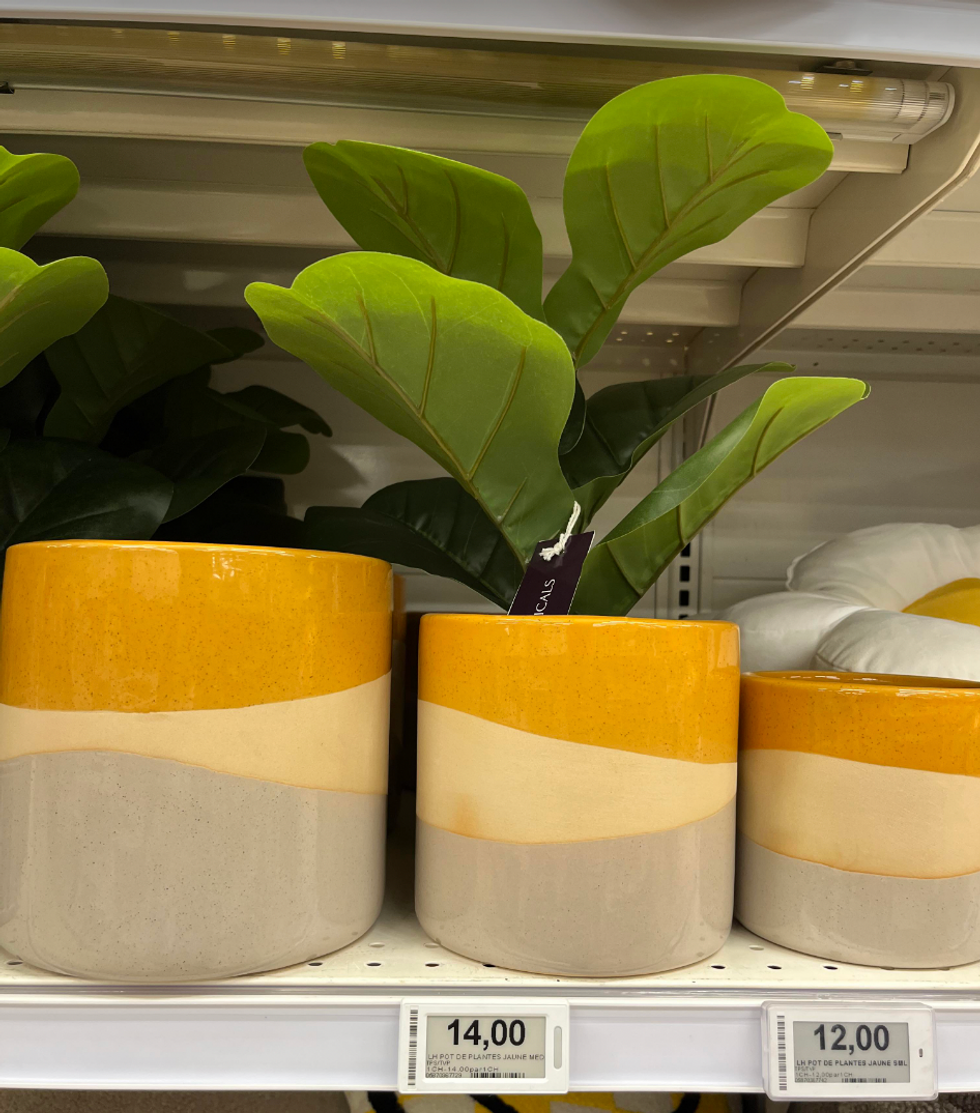 Yellow and beige flower pot from Maxi & Cie.
